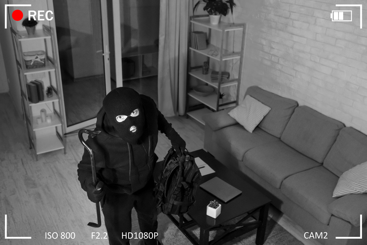 Thief With Crowbar Entering House View From Camera